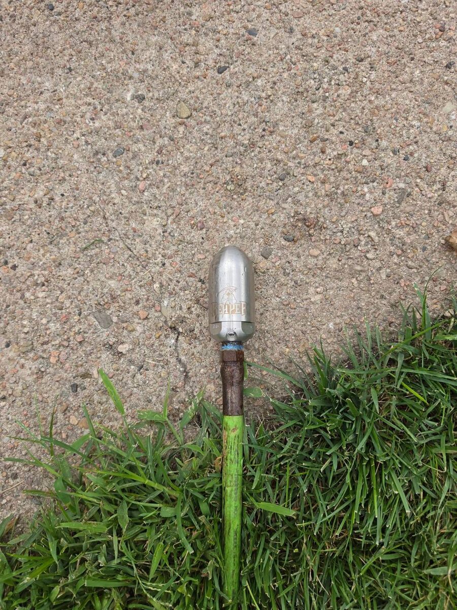 Close-up of a hydro jetter nozzle on the end of the 3,500 PSI drain cleaning hose